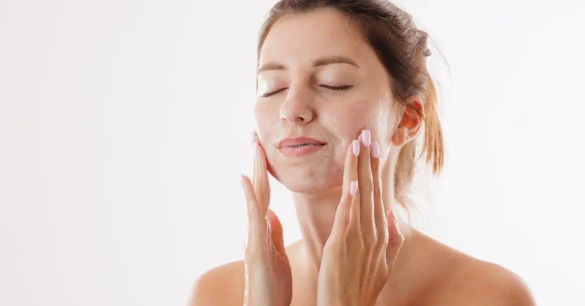 A woman applying serum during her morning Daily Skincare Routine