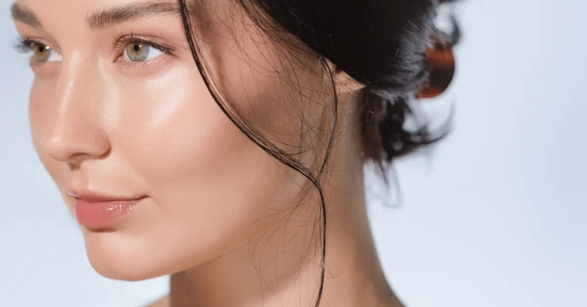 A young woman with fresh skin following our Glowing skin tips