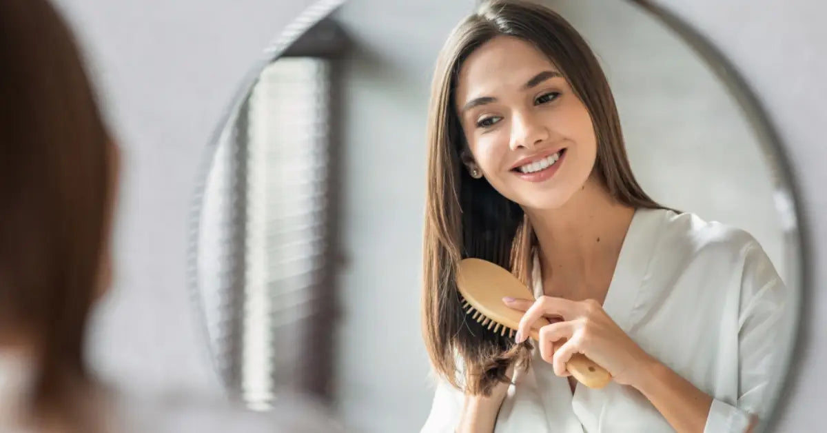 A young woman with thick healthy hair using our Hair Care Routine steps