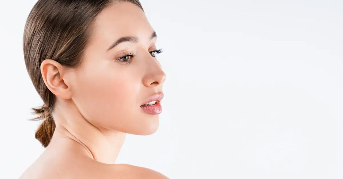 Woman applying face serum correctly as part of a daily skincare routine for smooth healthy-looking skin