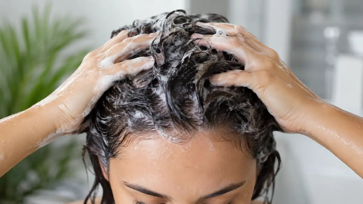 Scalp Cleansing Routine using gentle shampoo and scalp massage for a healthy, clean scalp.