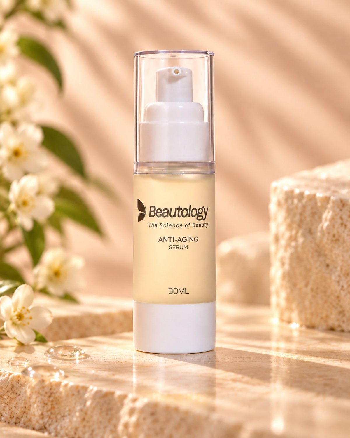 Beautology Anti-Aging Serum on a sunlit stone ledge with white jasmine blossoms
